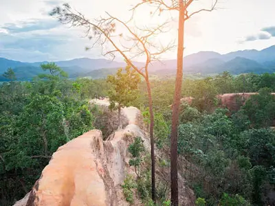 Winding mountain and jungle roads, bamboo raft adventure in Tham Lod Cave, arrival in bohemian Pai