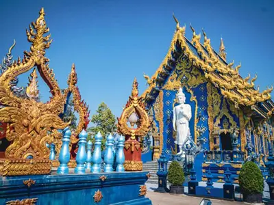 Exploring Chiang Rai’s White Temple, Blue Temple, Black House, with optional hikes to Doi Tung and Mae Salong